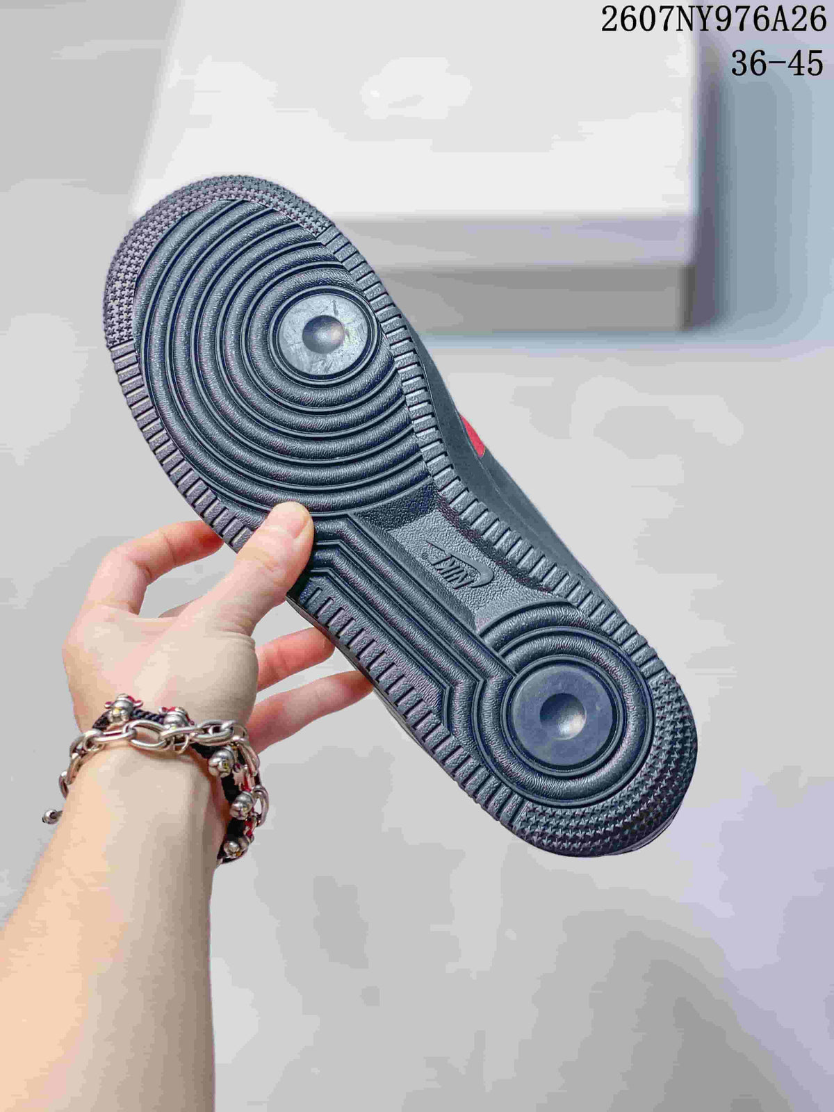 Underside view showing the black rubber outsole with circular traction patterns.