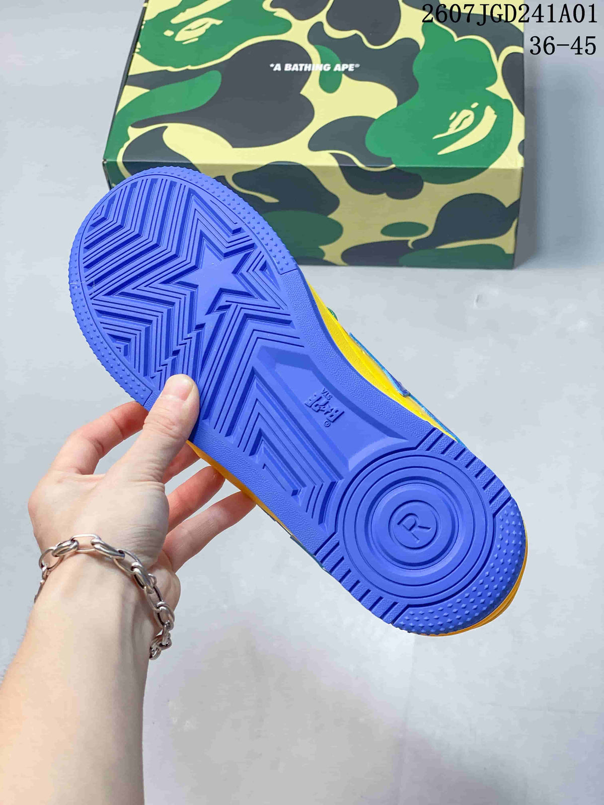 Blue outsole of the sneaker held in front of a camouflage-patterned box