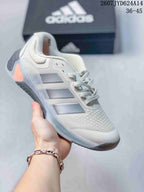 White adidas Dropset 4 training shoe with gray side stripes and a translucent heel accent.