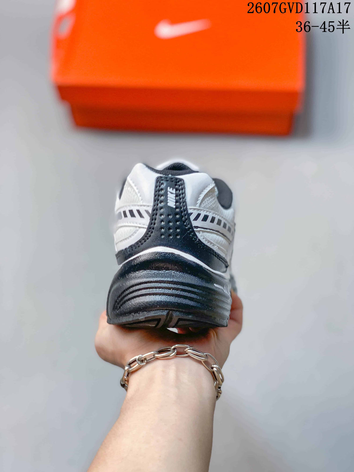 Rear view showing the padded heel, black heel panel and layered outsole of the sneaker.