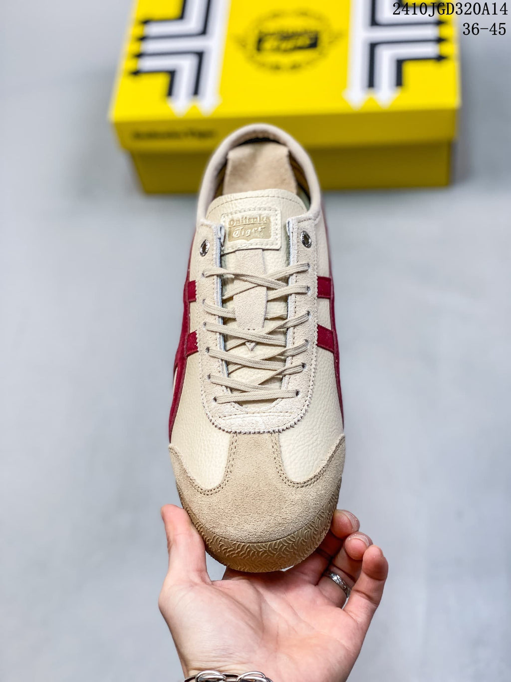 Top view showing the cream lace-up front, tongue label, red side stripes, and suede-look toe overlay.