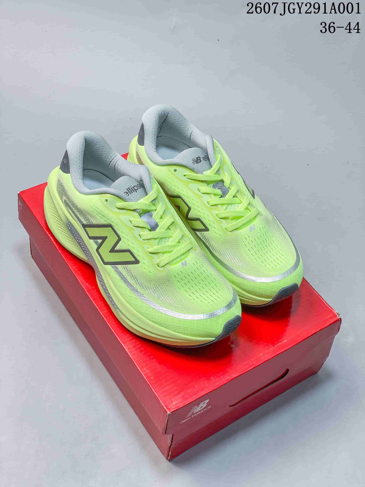 Pair of lime New Balance running shoes displayed on a red shoebox