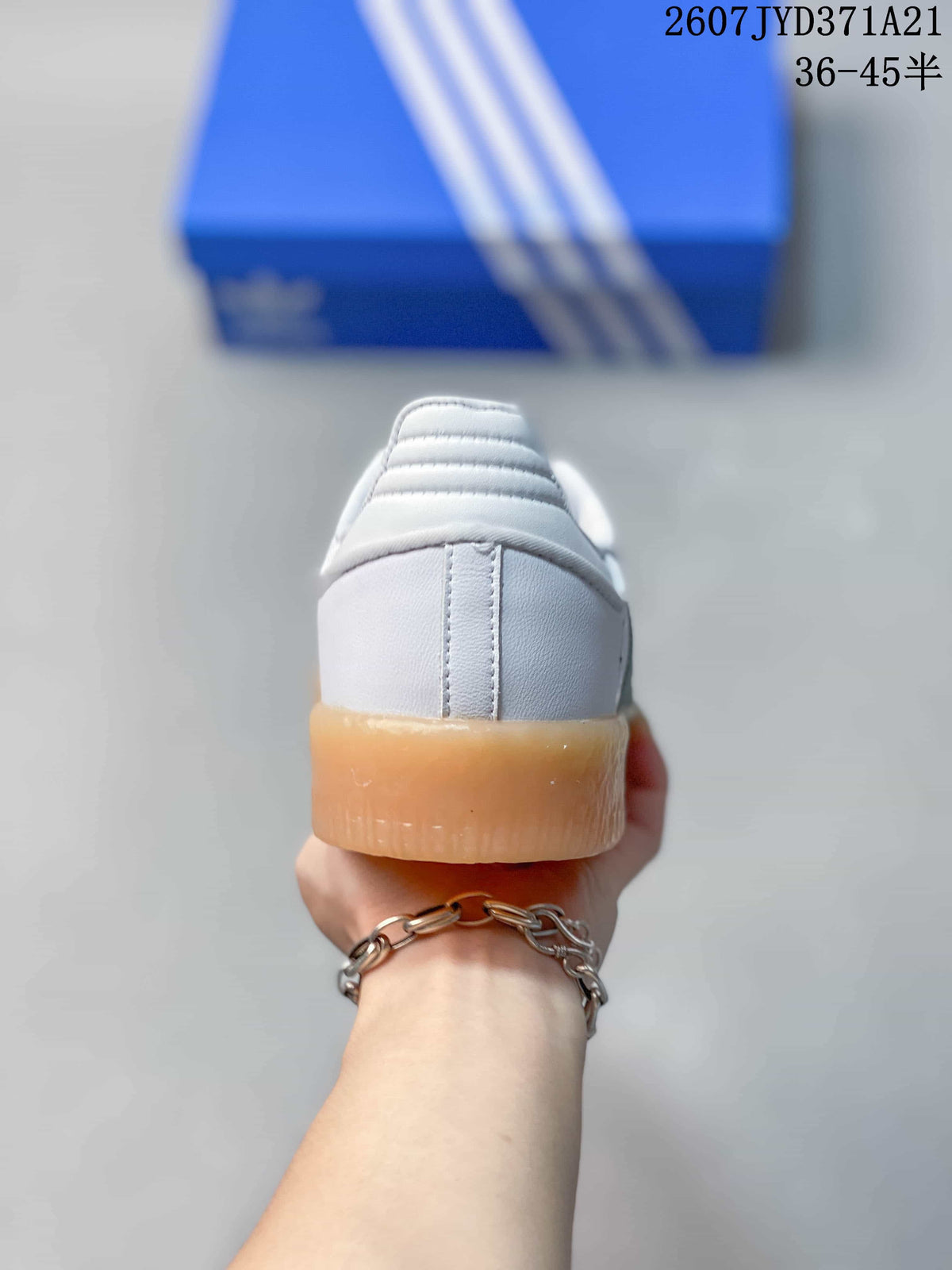 Rear view showing the white heel, padded collar, and gum-colored outsole.