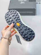 Close-up of the shoe's dark lugged outsole