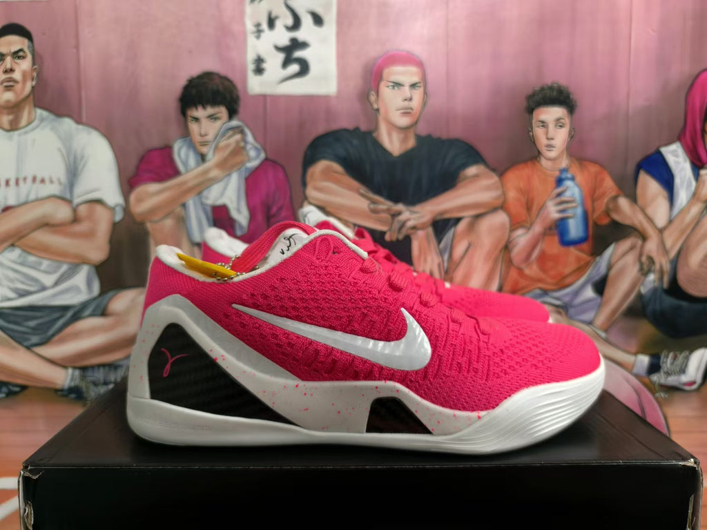 Side view showing the white Swoosh, black side panel, and speckled midsole