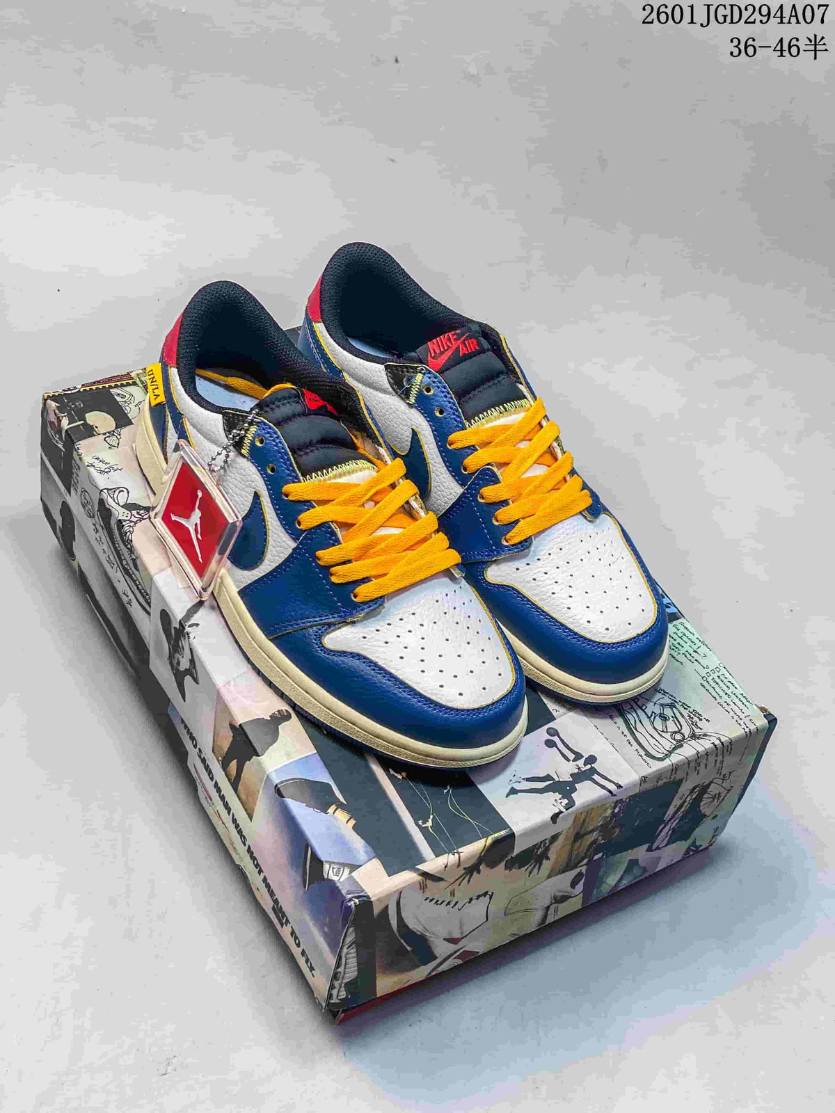 Blue, white, and red low-top sneakers with yellow laces on a graphic shoe box