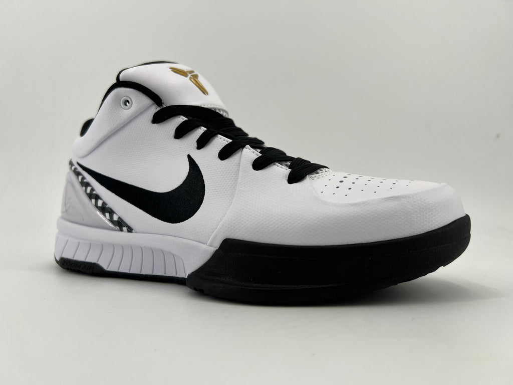 Three-quarter view of the white and black GIGI basketball shoe
