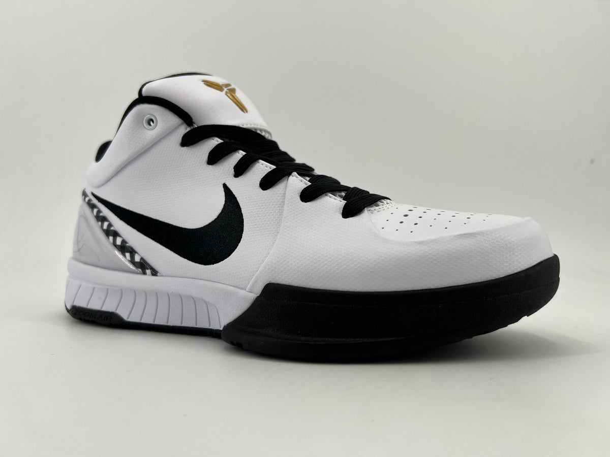Three-quarter view of the white and black GIGI basketball shoe