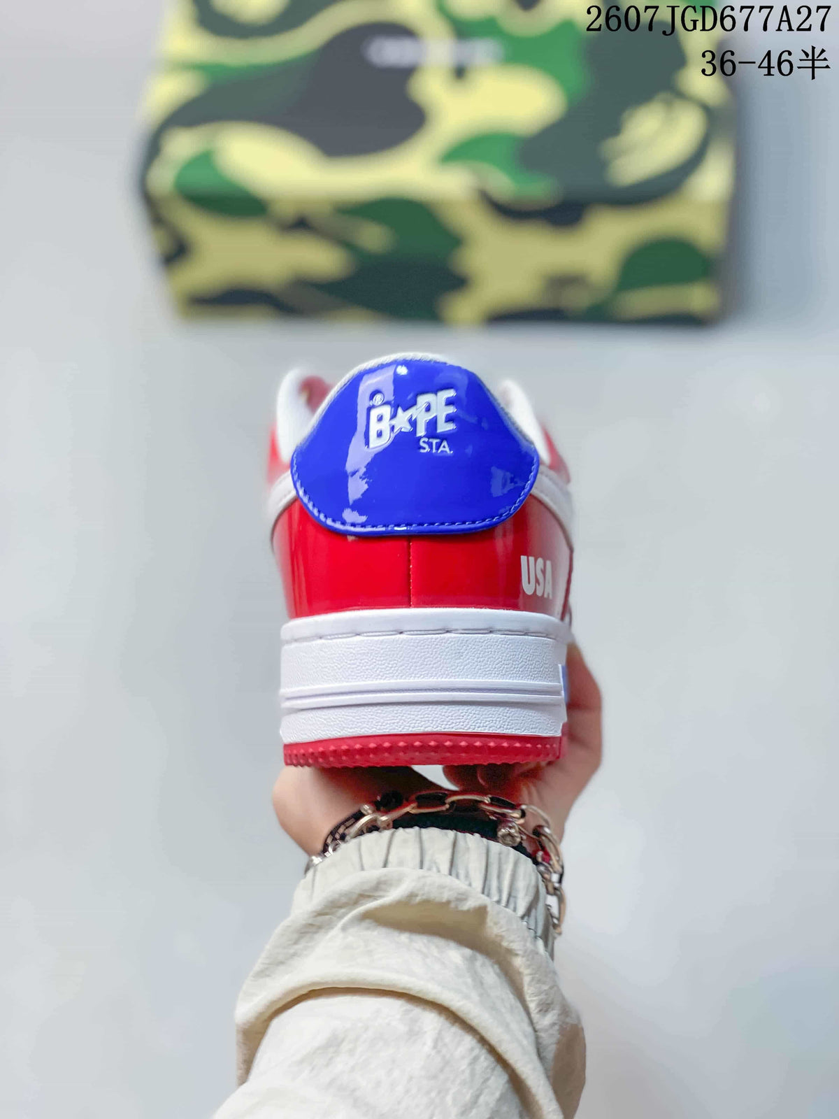 Rear view showing the blue heel tab, BAPE STA tongue branding, red heel panel, and white midsole.