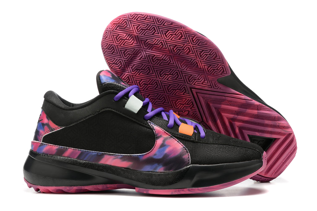 Black basketball shoes with a multicolor patterned Swoosh and pink patterned outsole.
