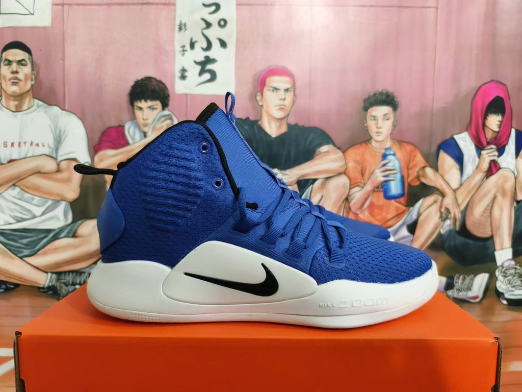 Side view of a blue Nike Hyperdunk shoe with a black Swoosh and white midsole