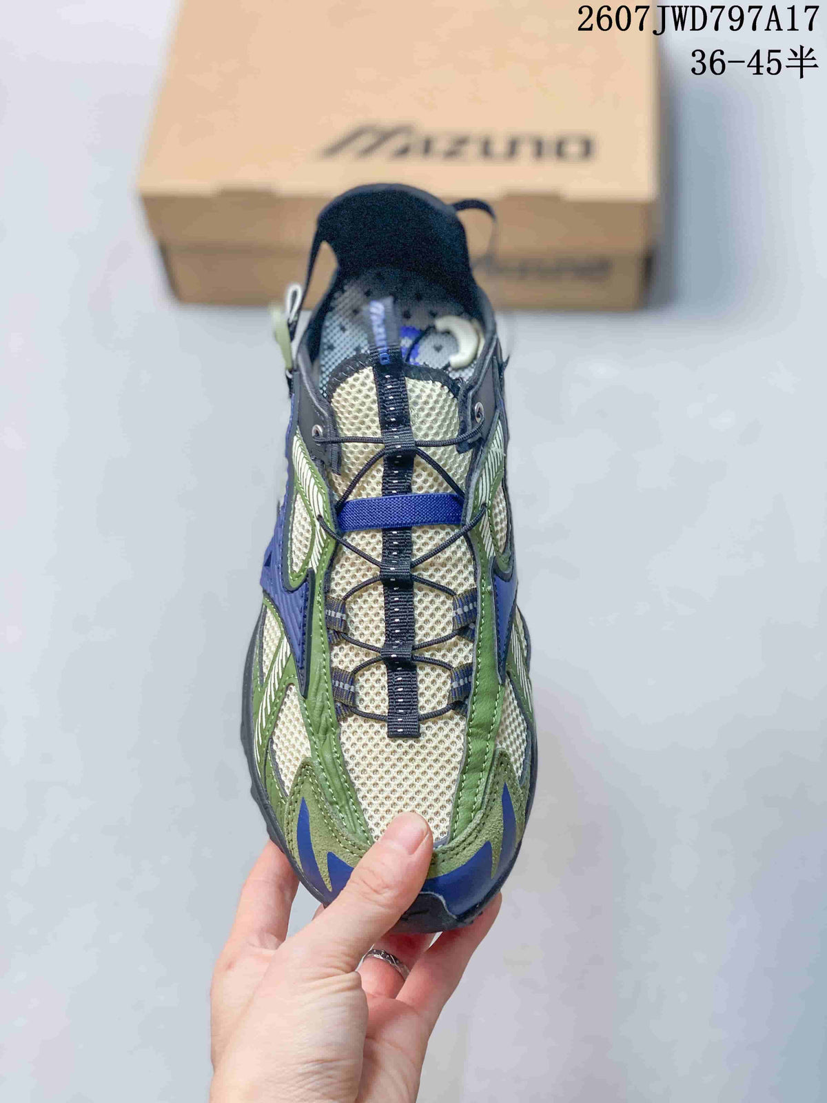 Top view showing the cream mesh-look toe area, layered panels, and lace system.
