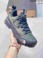 Angled view of the shoe showing its low-top shape, lacing, and toe overlay.