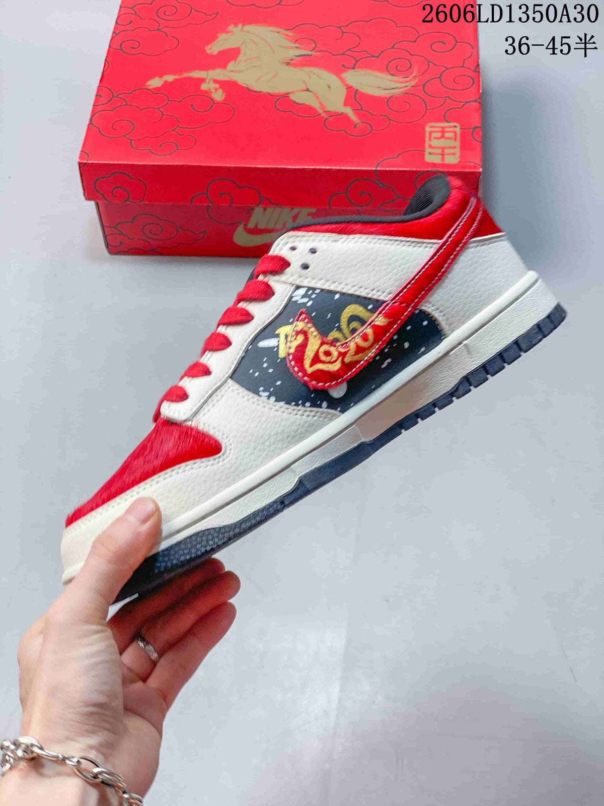 Side view showing horse-themed graphics and decorative Swoosh on a Nike SB Dunk Low