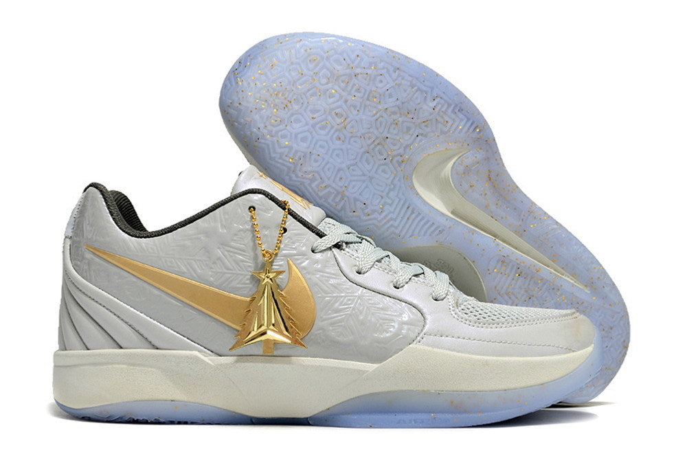 Gray and gold Ja 2 shoe side profile with the outsole visible.