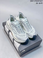 Pair of light gray and white adidas HOLO PEAK sneakers displayed on an adidas shoebox.