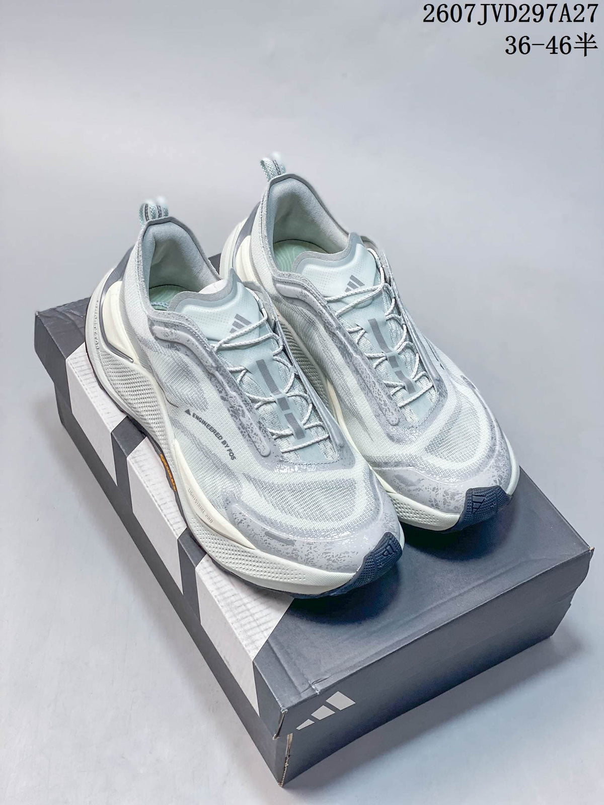 Pair of light gray and white adidas HOLO PEAK sneakers displayed on an adidas shoebox.