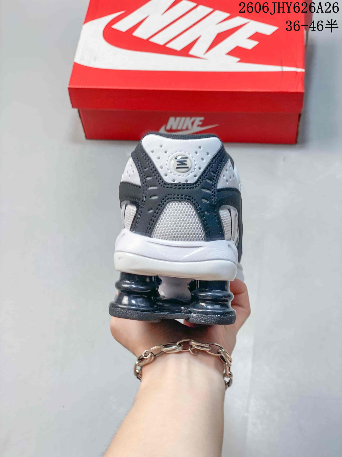 Rear view of the sneaker showing the pod-style heel and layered upper