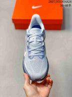 Top view showing the lace-up closure, patterned toe box, and padded tongue.