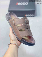 Angled close-up of the brown sandal showing the ECCO branding, layered straps, open toe, and textured outsole.