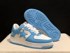 Angled view showing the blue patterned outsole beneath one shoe and the star side design on the other.