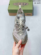 Top view of a KEEN Zionic ADV shoe with bungee-style laces and cord lock.