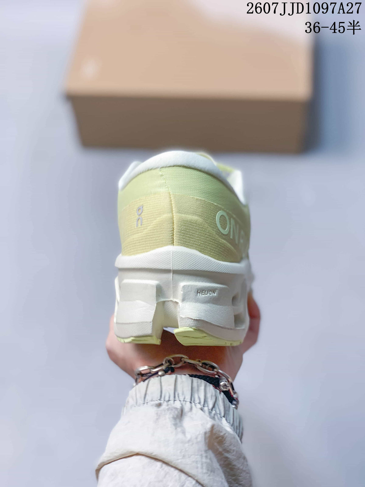 Rear view of the sneaker showing the padded heel, On branding and segmented sole structure.