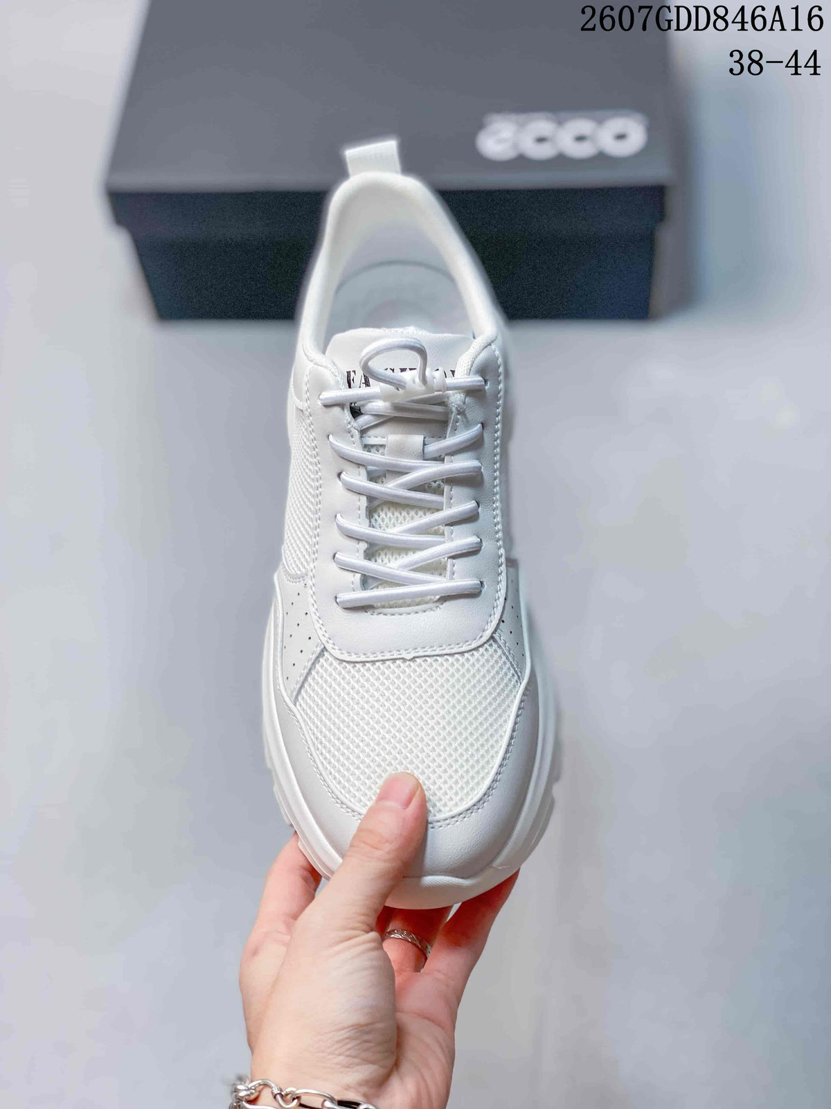 Top view of the white lace-up sneaker showing its mesh-look toe panel and white laces.