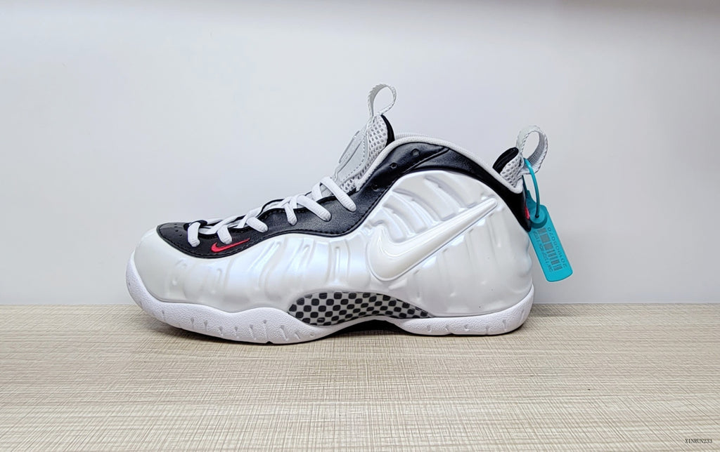 Side profile showing the sculpted upper and white side Swoosh