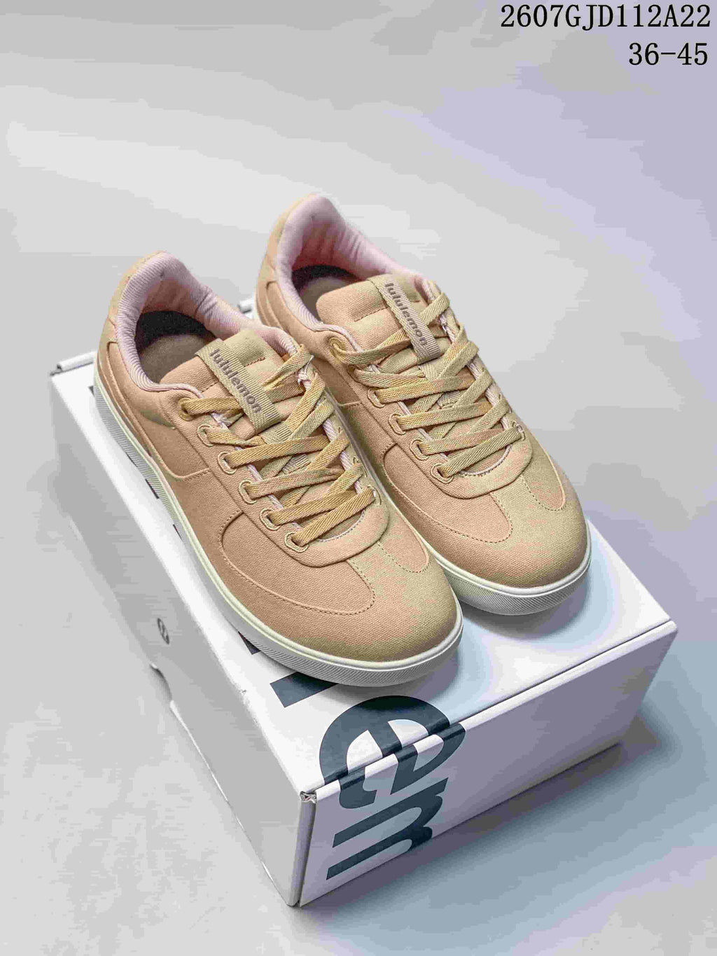 Pair of tan lululemon Cityverse low-top sneakers displayed on a shoebox; source image text shows 2607GJD112A22 and 36-45.