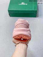 Rear view showing the heel and sole of a pink sneaker