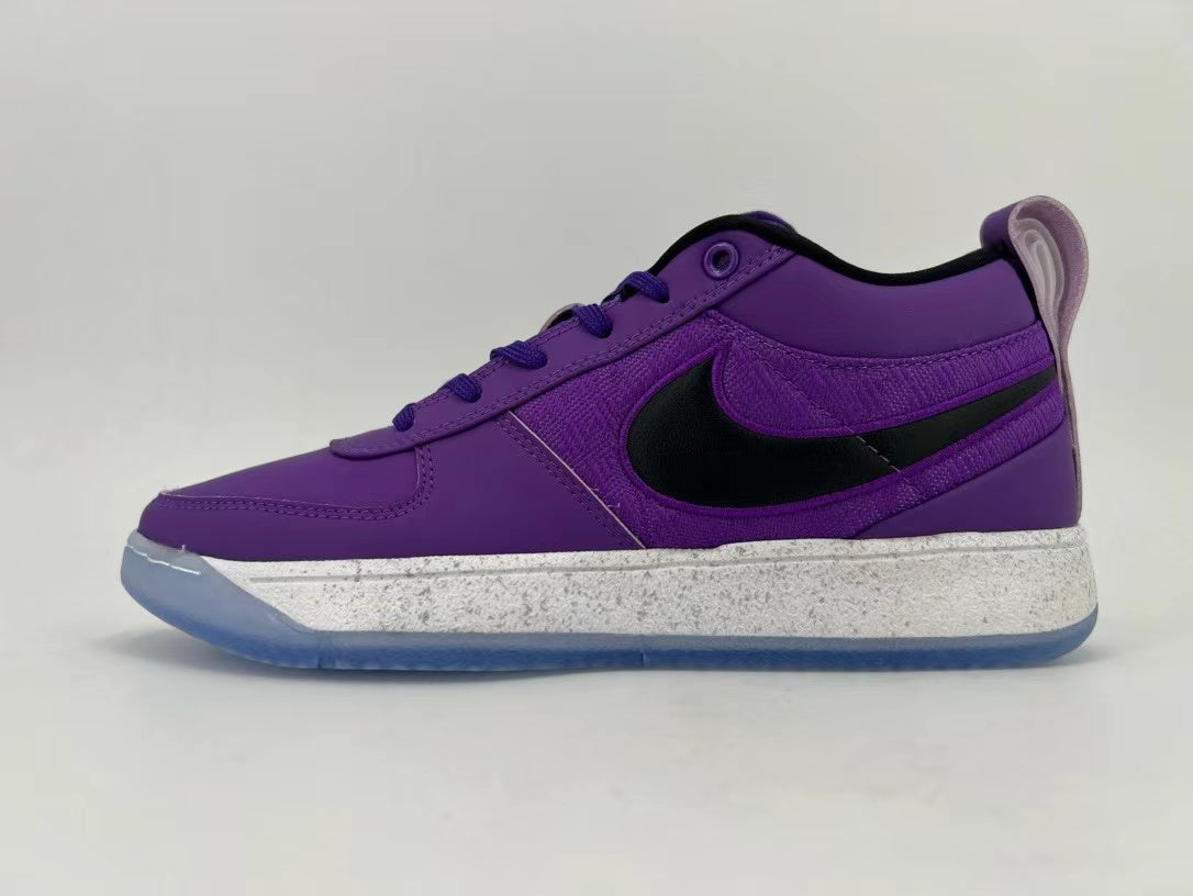Side view of purple low-top Nike sneakers with a black Swoosh, speckled light midsole, and translucent blue outsole.