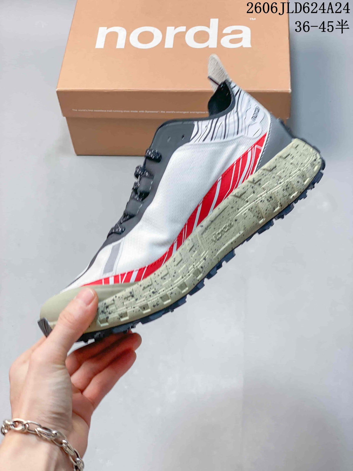 Side view of a white and red Norda trail shoe with a speckled light olive midsole.