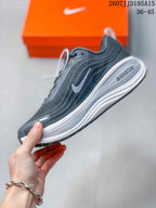 Side view showing the gray textile-style upper, Swoosh branding, and sculpted white midsole.