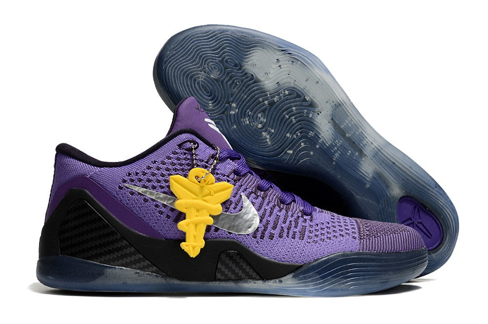 Purple shoe with a dark outsole and yellow hanging accent.