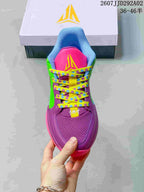 Top view of the basketball shoe showing the purple toe area, padded tongue and patterned yellow laces.