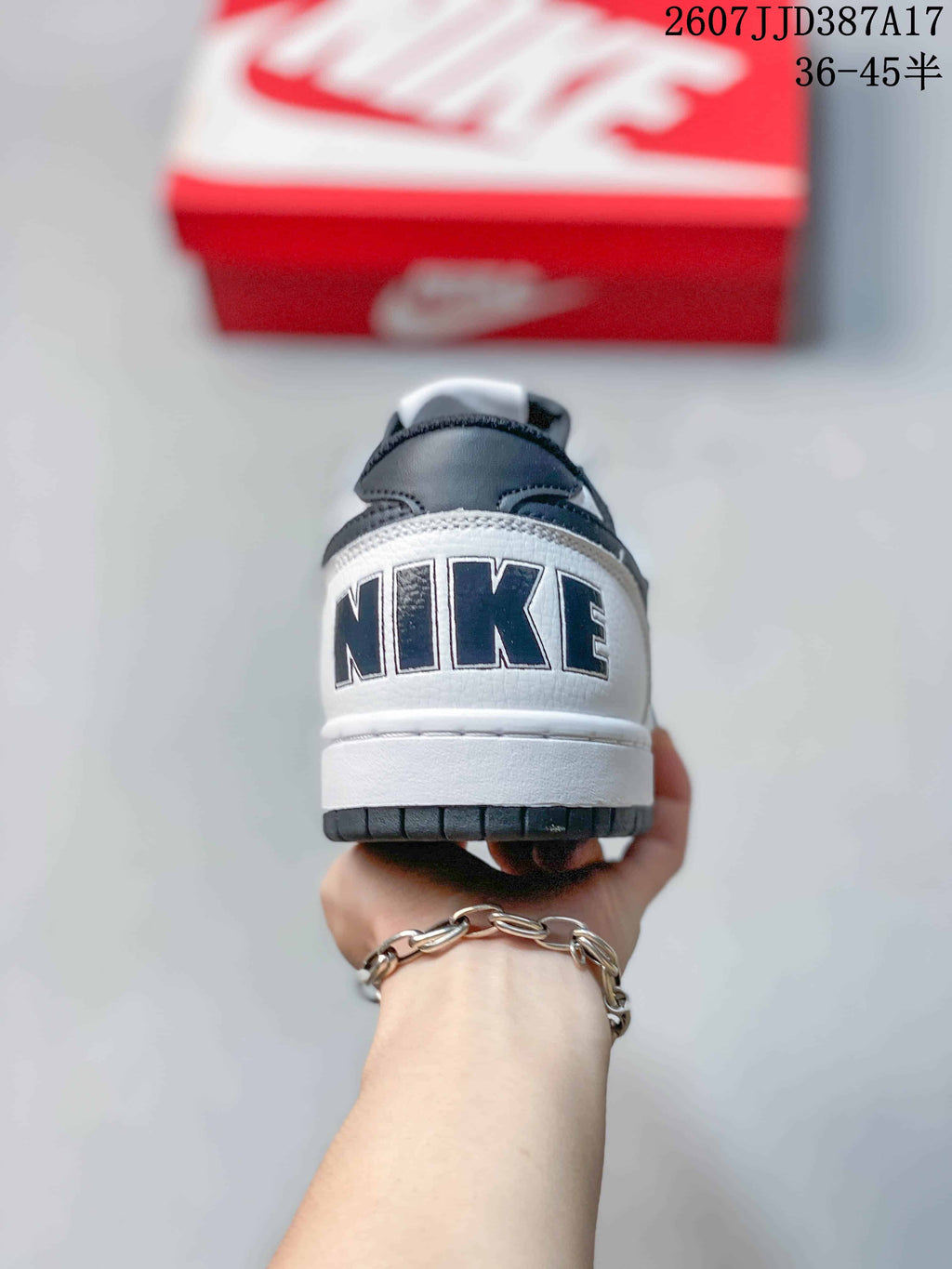 Rear view showing the contrasting black heel collar and Nike branding across the heel.