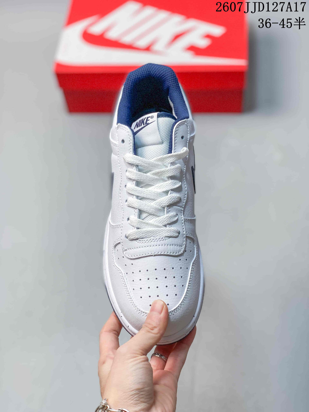 Top view showing the white laces, padded tongue and perforated toe box.