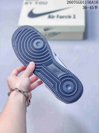 Close-up of the dark rubber outsole showing concentric traction circles and patterned perimeter tread.