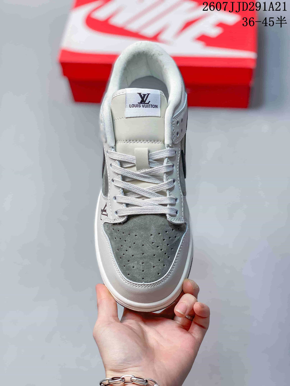 Top view showing the white laces, padded tongue, perforated grey toe panel, and visible Louis Vuitton tongue branding.