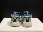 Rear view of the pair showing blue pull tabs, teal mesh, black heel panels, and chunky soles.