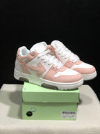Pair of white and pale pink Off-White Out Of Office sneakers displayed on a green shoebox; the box label shows size 40.