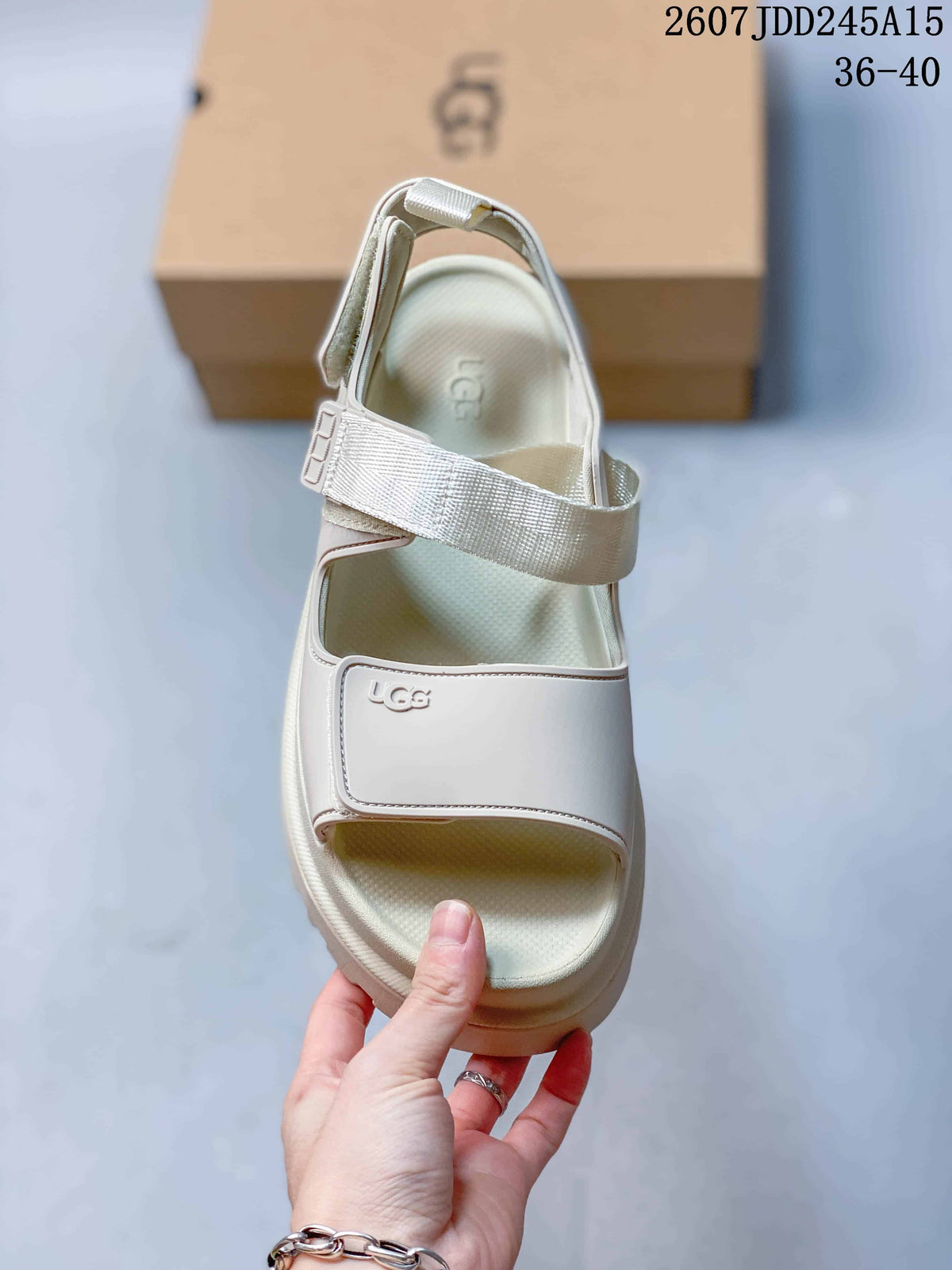 Top view of the light white sandal showing the open toe, textured footbed, front strap, and ankle strap.