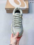 Top view of the sneaker showing the lace-up closure, padded tongue, mesh-style toe box, and ASICS branding; overlay text shows style code 2607TGD295A05 and size range 36–45.