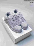 Pair of gray low-top lace-up sneakers displayed on a white shoebox; image text shows style 2607HJD305A15 and size range 36–47.