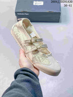 Pale lavender sneaker shown from above with two buckle straps