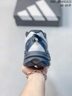 Rear view of the shoe showing the padded heel area, Terrex branding and layered outsole.