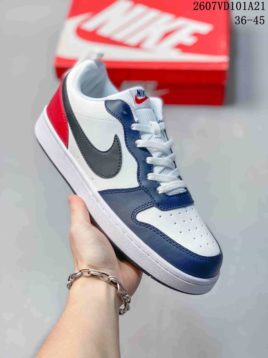 Angled side view highlighting the high-top shape, contrast panels and white midsole.