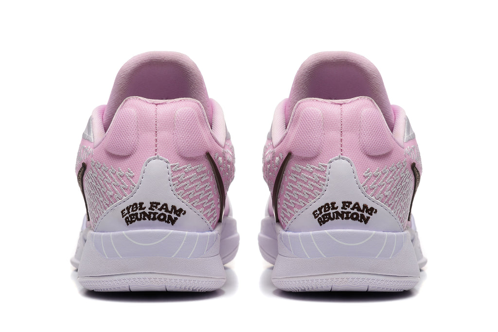 Rear view of the pink basketball shoes with patterned heel panels.