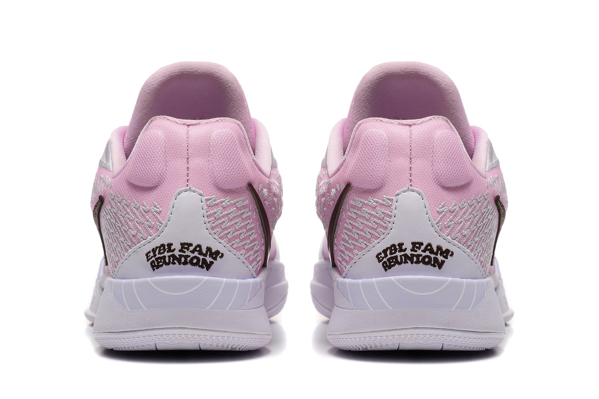 Rear view of the pink basketball shoes with patterned heel panels.